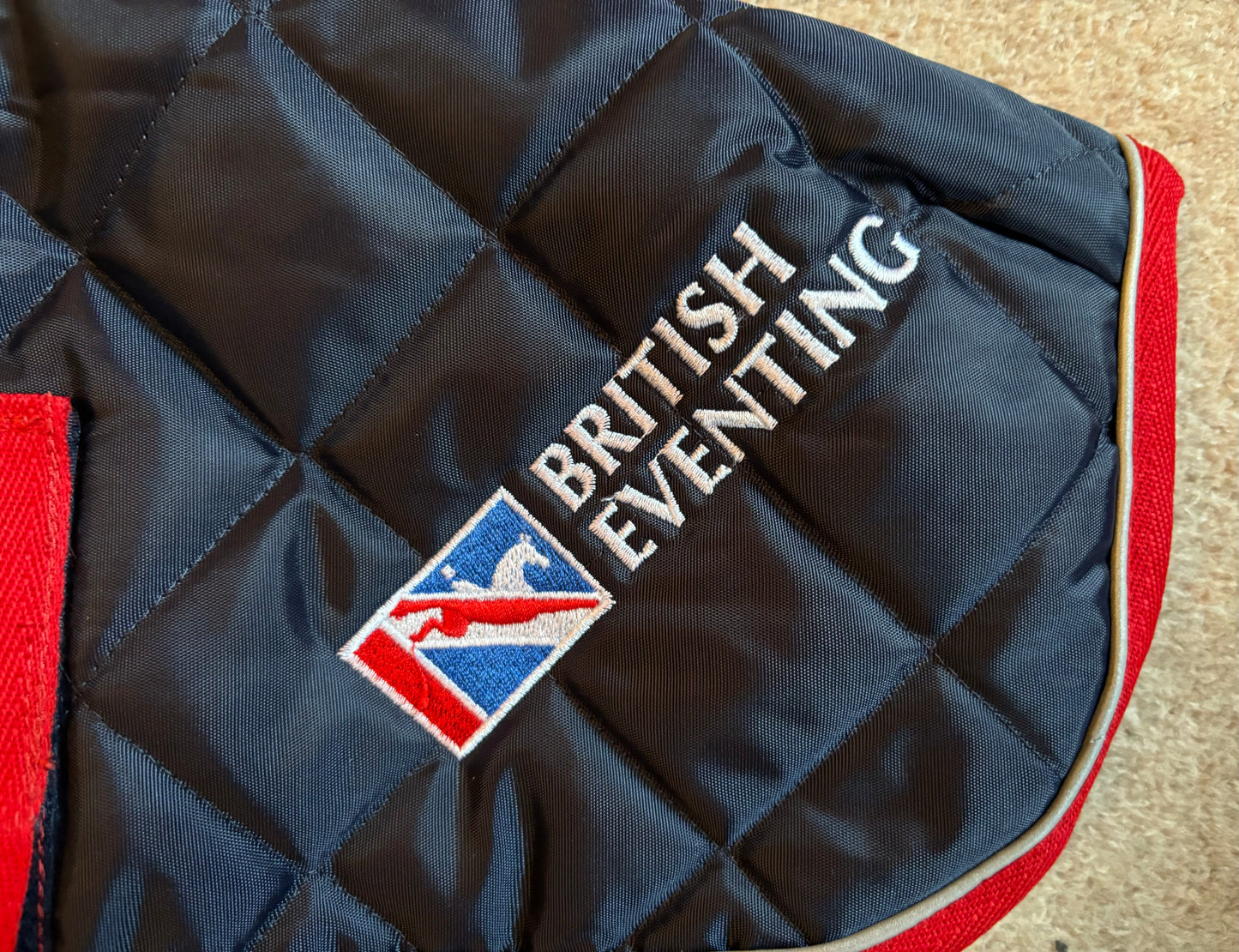 Showerproof Quilted Dog Coat - Lansdown British Eventing - Navy with Red and Reflective Binding